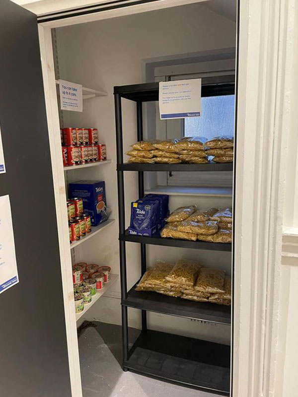 A cupboard in the Garrod Building with food supplies on the shelves