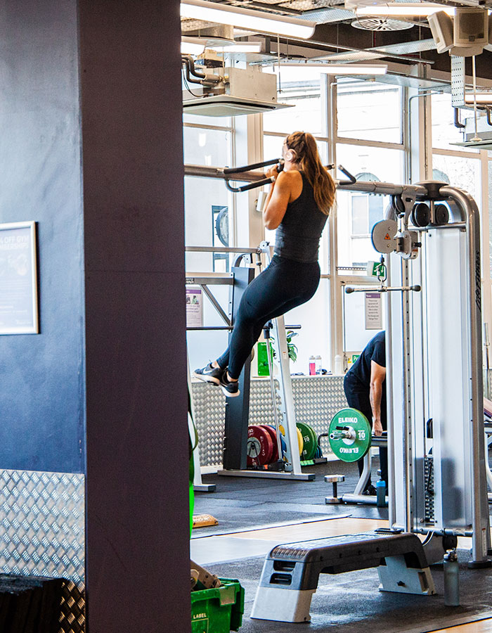 A person doing a pull up